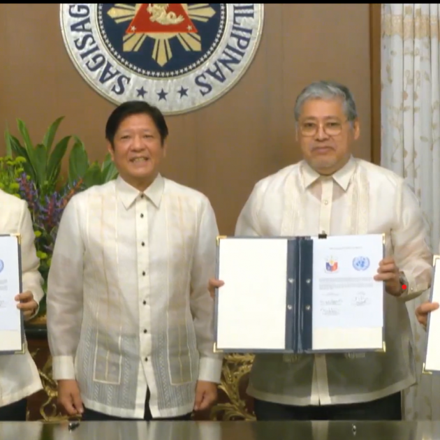 Officials from the UN and Government of the Philippines who signed the document